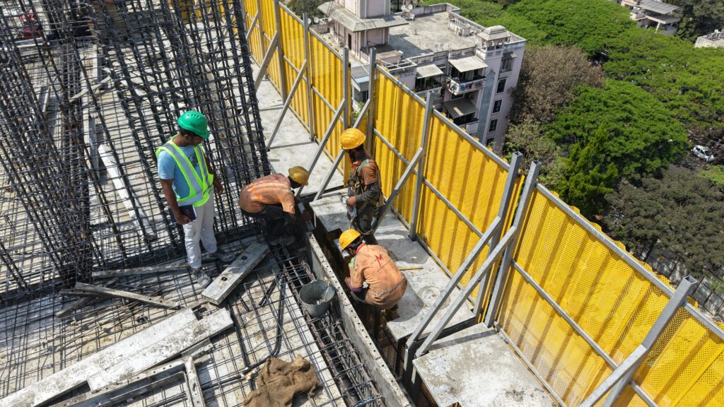 Modern Construction site using scaffolding systems for safe building work